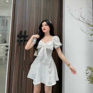 Đầm trắng nơ ngực to
