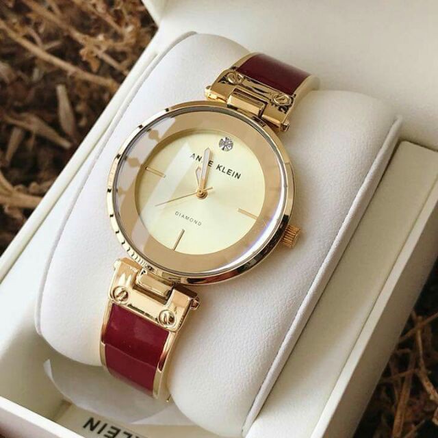 Đồng hồ nữ ANNE KLEIN kiềng đá model AK/2512BYGB- ĐỎ