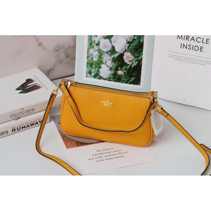 Túi coach mini vàng