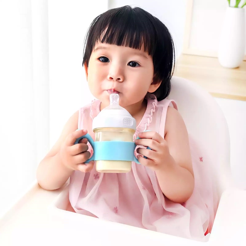 Quai cầm bình sữa cánh thiên thần silicon cho bé, ngậm nướu quai cầm silicone - Monnie Kids