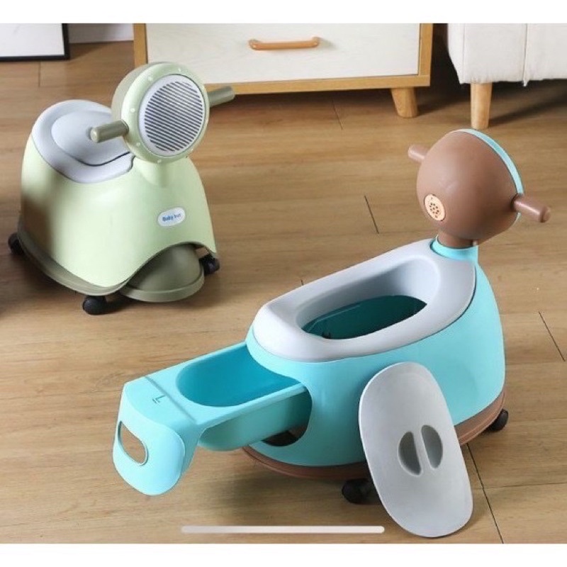 Bô vệ sinh cho bé hình xe máy- bô trẻ em có bánh xe di chuyển được