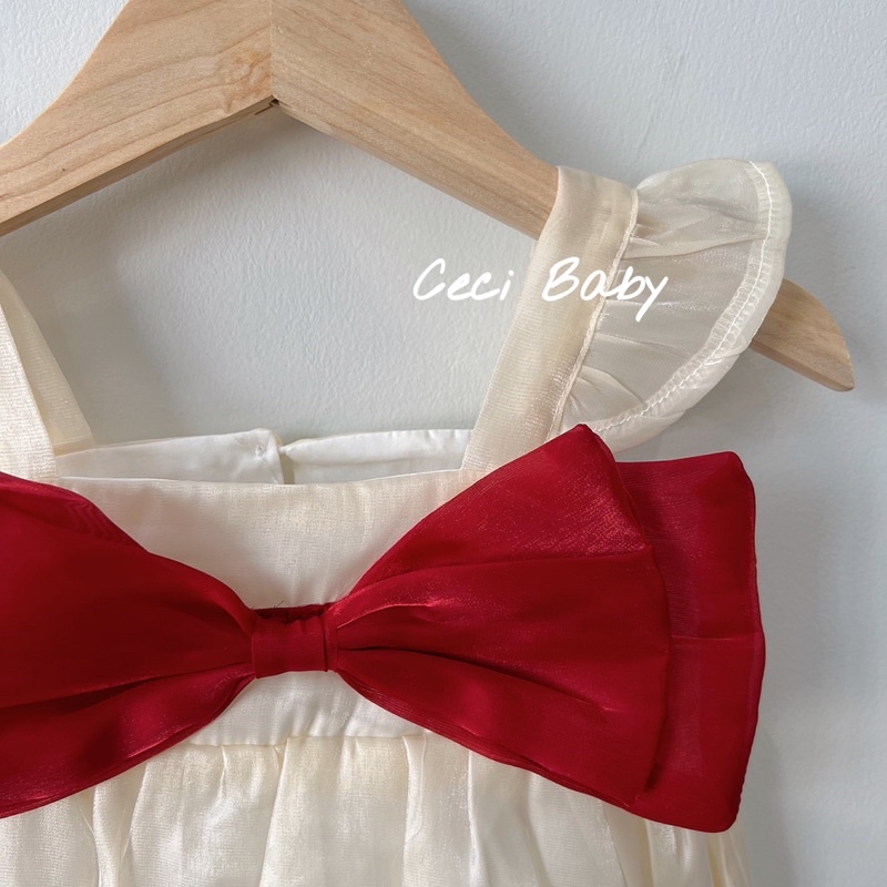 Body chip bé gái sơ sinh màu kem nơ đỏ xinh xắn ảnh thật