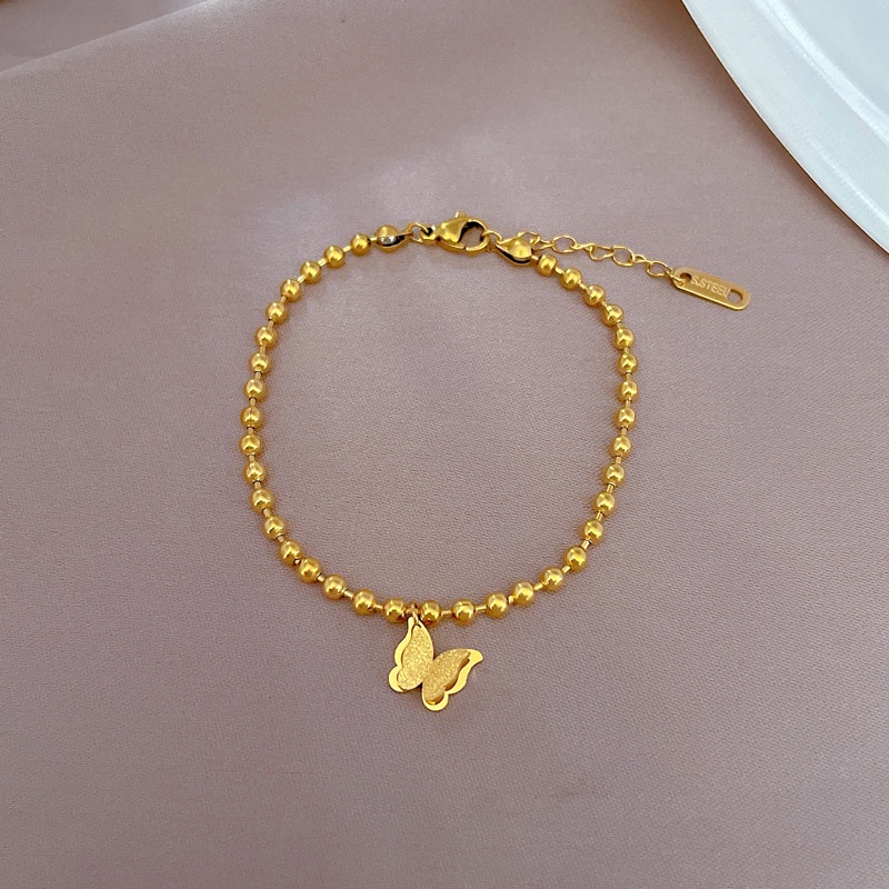 Vòng tay titan không gỉ mạ vàng 18k thiết kế bi tròn mặt hình bướm xinh xắn dành cho nữ