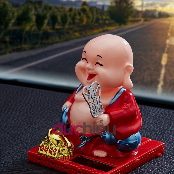 Tượng phật Di Lặc gật đầu cầm quạt lắc sử dụng năng lượng mặt trời dùng vĩnh viễn – Đức Hiếu Shop