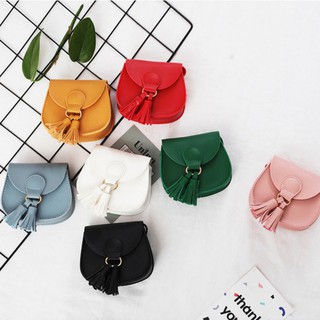 Túi đeo chéo da PU phối núm tua màu trơn nổi bật dễ thương cho bé gái