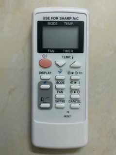 Điều khiển điều hoà Sharp kèm pin