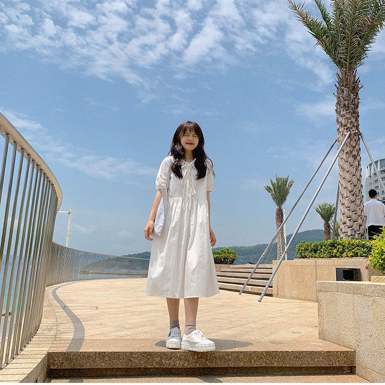 Váy đầm babydoll trắng tay phồng dáng dài babydoll đầm phong cách dễ thương thắt nơ vải thô mát mùa hè