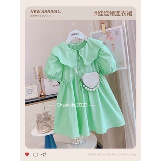 Váy xanh tay bồng lượn sóng bé gái