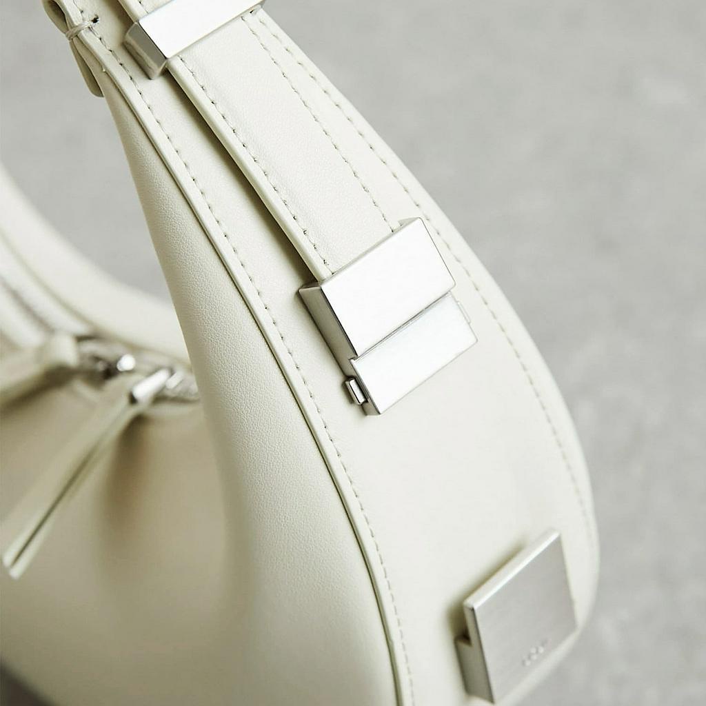 Túi da thật dáng cong bán nguyệt - TONI