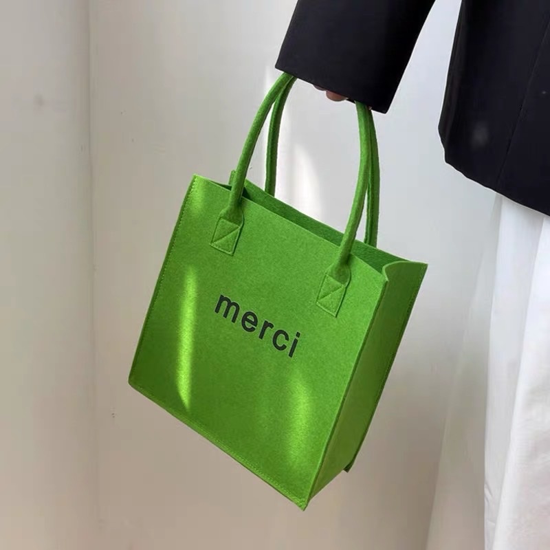 Túi cầm tay chất nỉ in chữ merci màu xanh thời trang trend phong cách hàn quốc