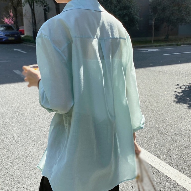 Áo sơ mi tay dài phối nút thiết kế oversized cho phái nữ