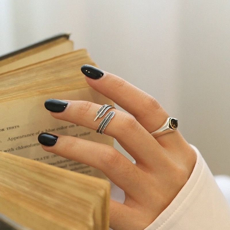 Nhẫn hình lông vũ thời trang cá tính độc đáo