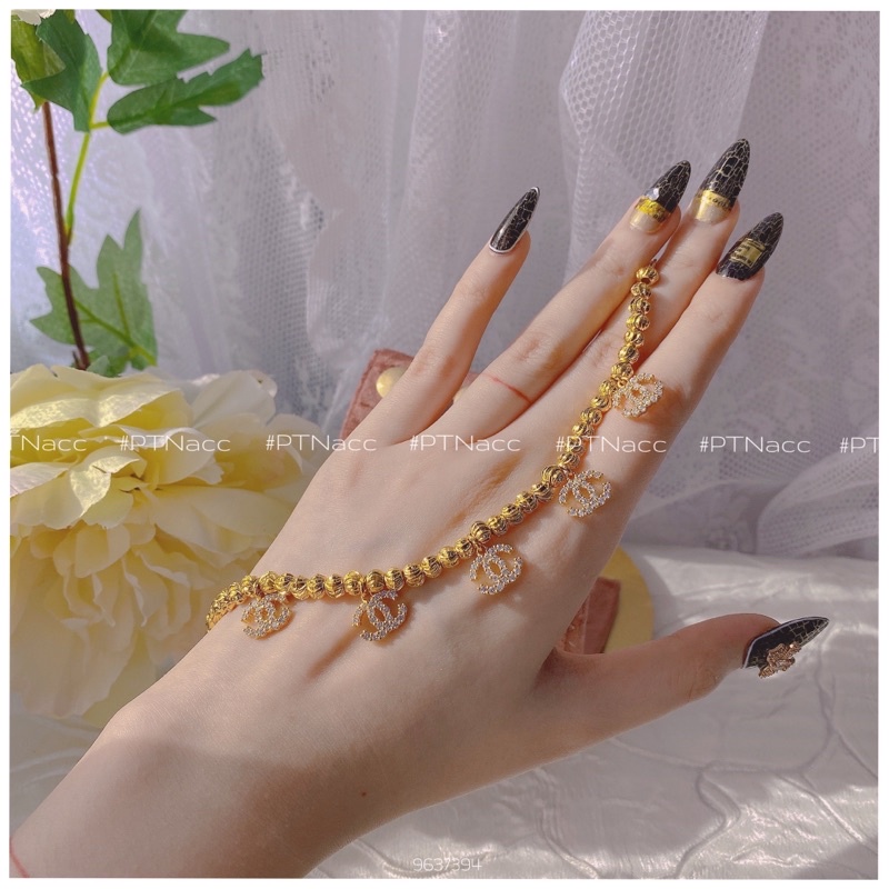 Lắc tay bi xi 2 màu trắng, vàng charm logo X, lắc bi charm thương hiệu sang trọng .PTNACC.