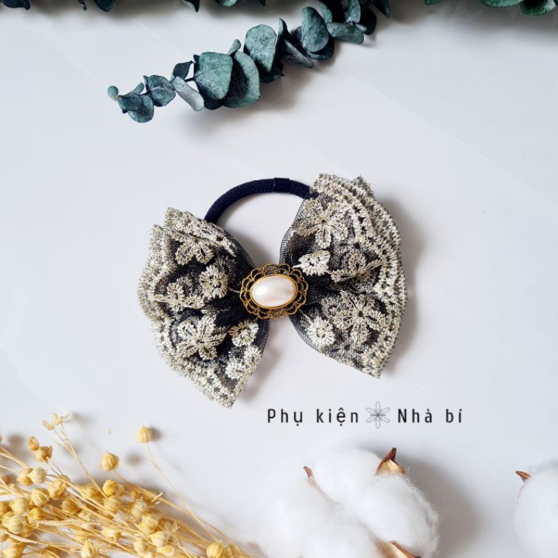 Cột tóc nơ Nhà bí