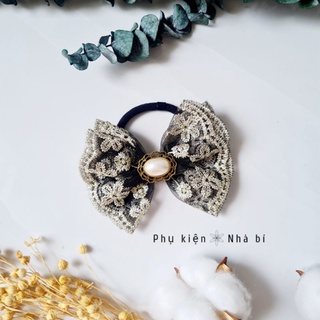 Cột tóc nơ Nhà bí