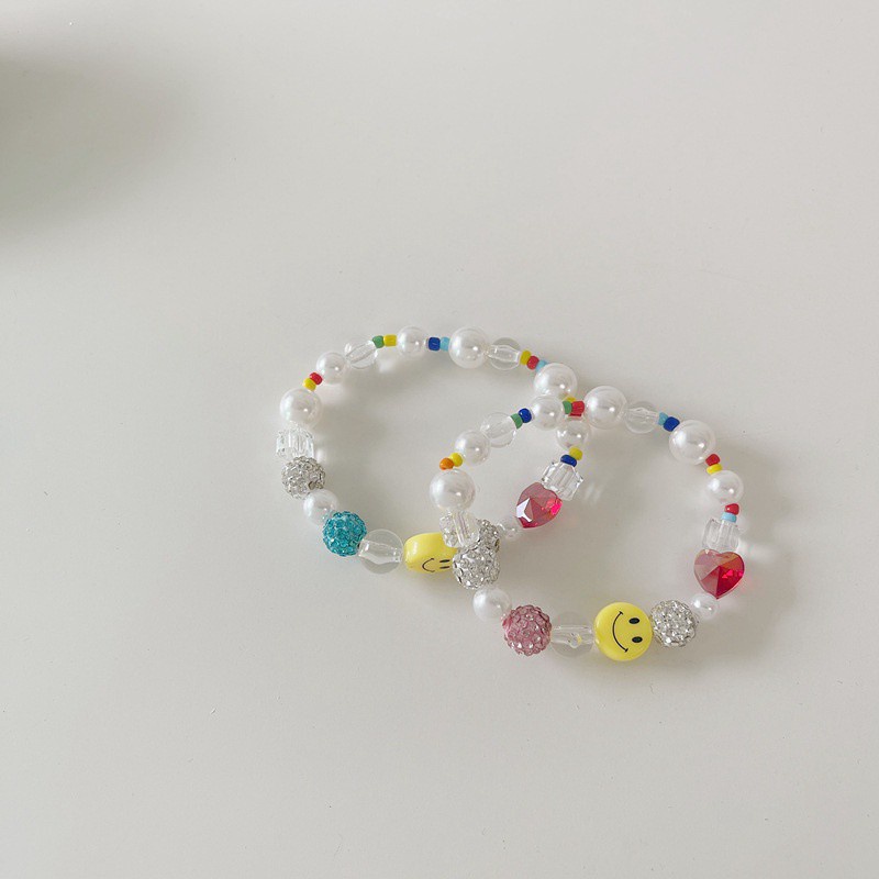 Vòng Tay Chuỗi Hạt Ngọc Trai Mặt Cười Hoạt Hình Cho Nữ