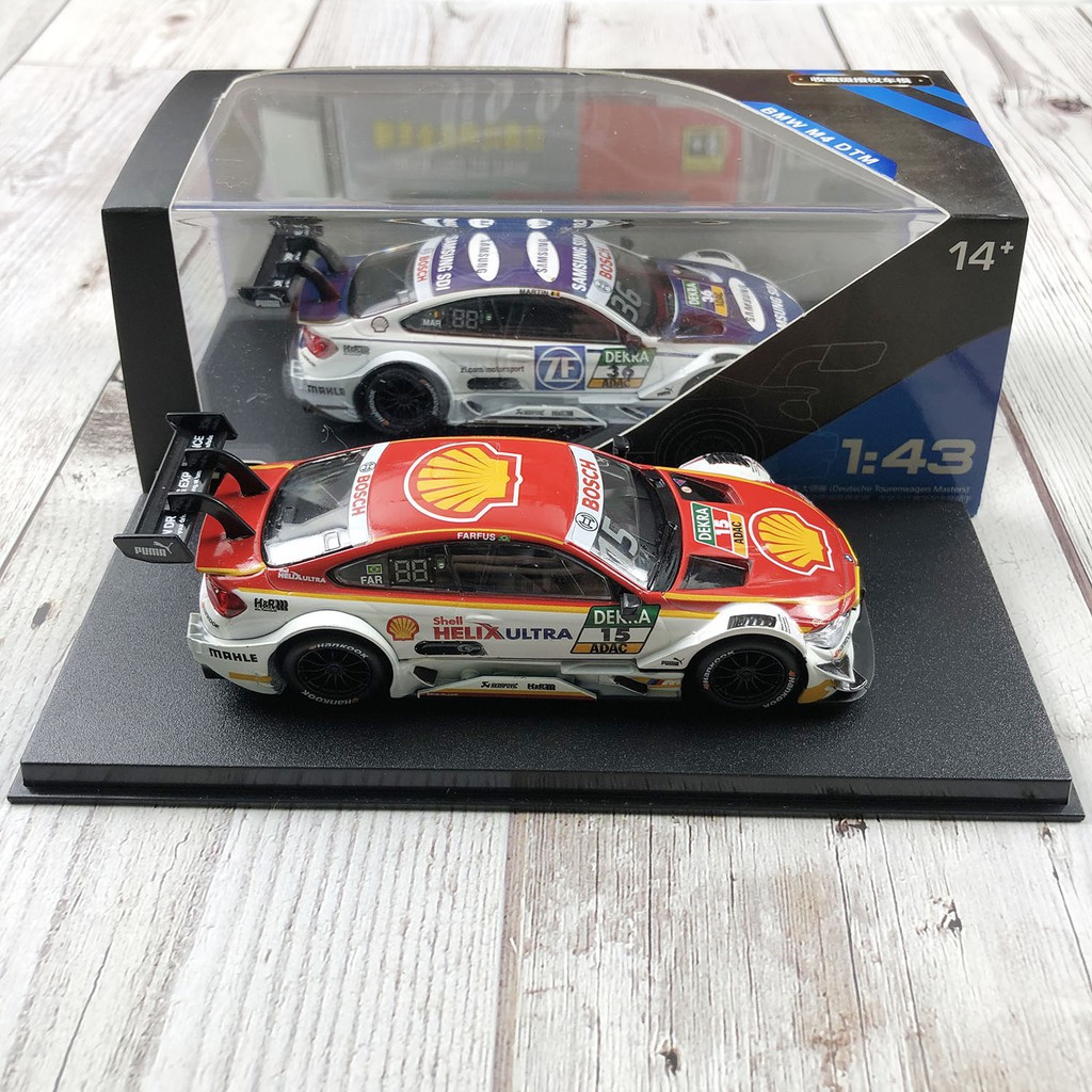 Xe mô hình xe đua công thức 1 BMW M4 DTM tỉ lệ 1:43 có đế trưng bày và hộp đựng trong suốt