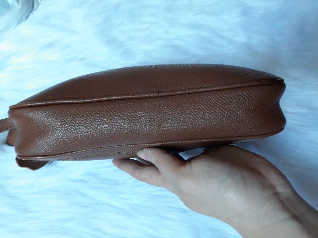 Túi cầm tay da thật