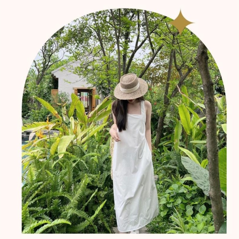 Váy maxi trắng đan chéo lưng thời trang đi biển