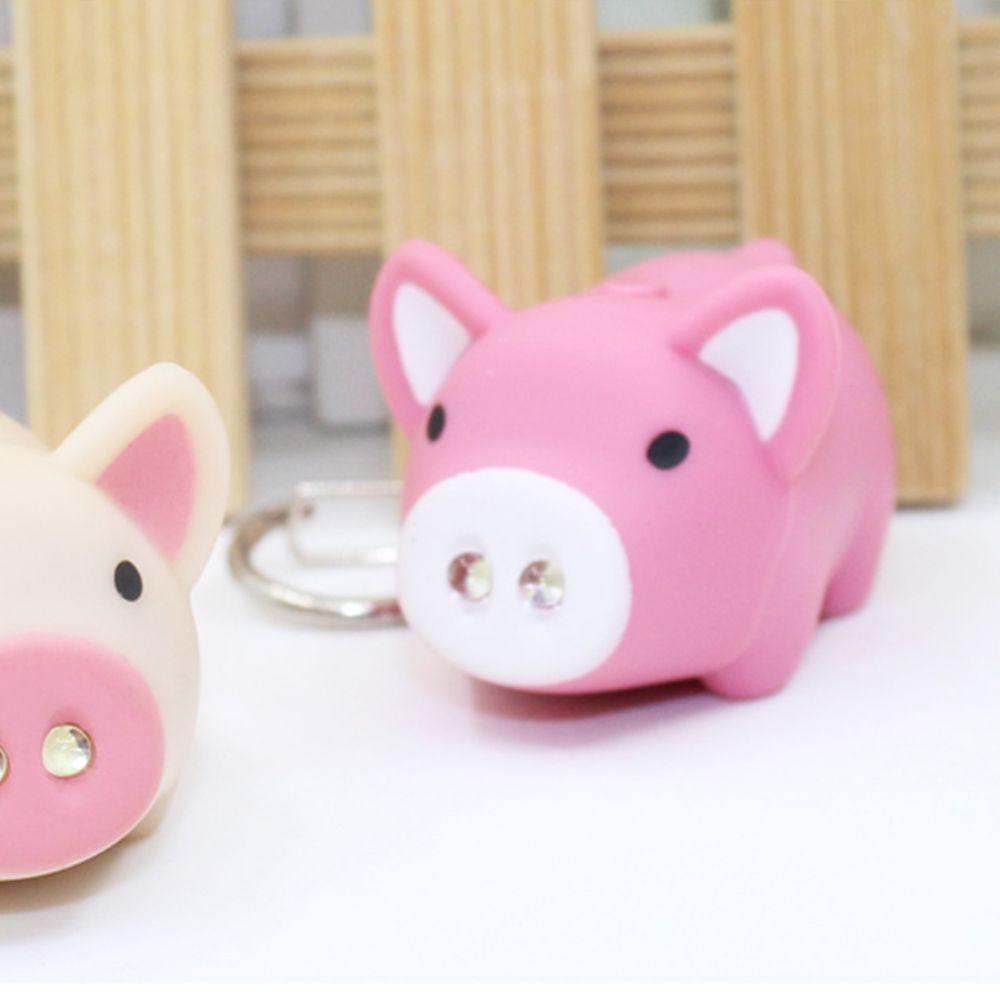 Móc Khóa Hình Heo Con Có Đèn LED Dễ Thương Giá Đỡ