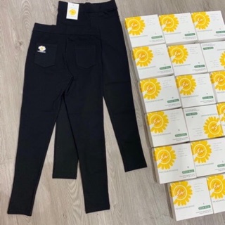 Quần legging in hoa cúc vàng