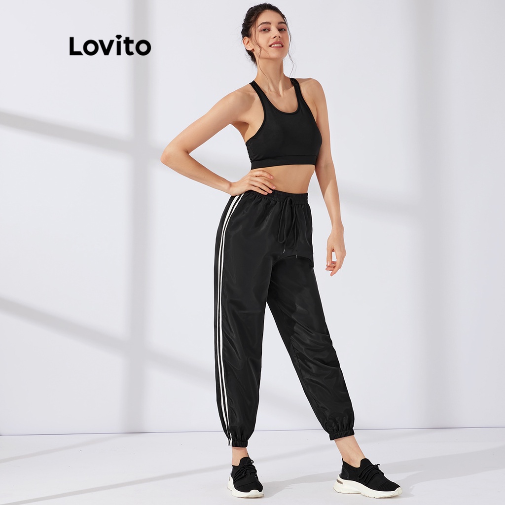 Quần thể thao Lovito chất liệu nylon với dây rộng cột phía trước phối viền tương phản L23AD051 (màu đen)