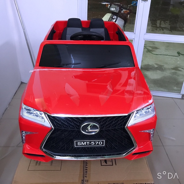 Xe điện LX 570 cho bé bản 4 động cơ , sơn thường có nhún.