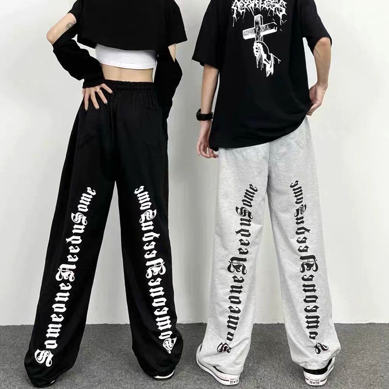 Quần jogger nam nữ Unisex in chữ sau ống rộng, quần phong cách Hàn Quốc chất liệu dày dặn 3 màu đen, trắng, xám. A3.