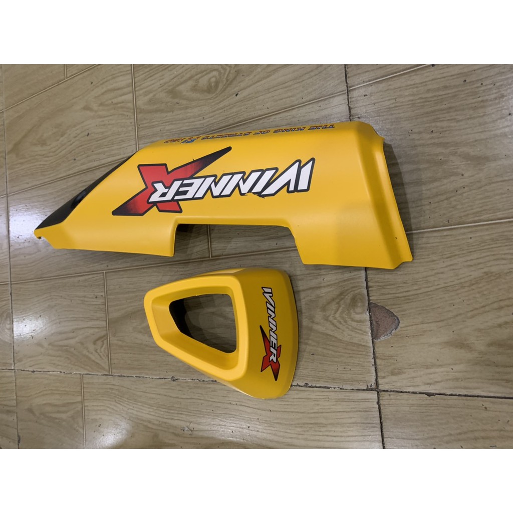 ốp pô và chụp đích pô xe winner x màu vàng