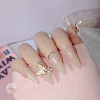 Móng tay giả - nailbox màu cam nude óng ánh đính charm nơ