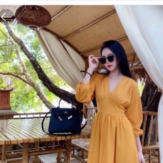 Váy thiết kế vàng bò