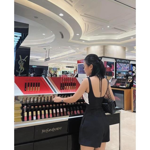 Jumpsuit đen phối nơ trắng