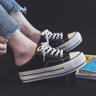 Giày sục thể thao nâng đế vải đen trắng