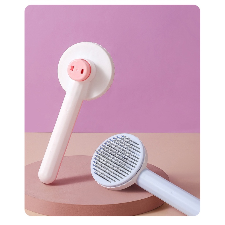 lược tròn chải lông rụng có nút bấm cho thỏ, chó, mèo