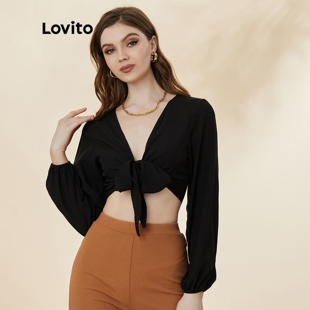 Áo kiểu Lovito cổ chữ V khoét sâu tay dài có dây buộc phía trước màu trơn mặc thường ngày L19D442 (Màu đen)
