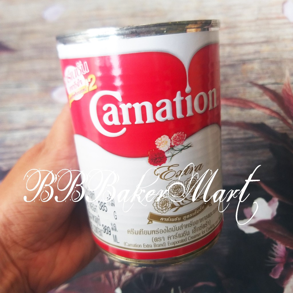 Sữa NƯỚC béo bay hơi CARNATION 3 bông Thái Lan - Lon 385gr