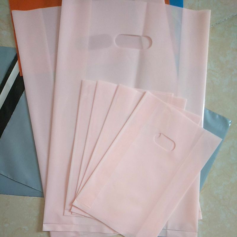 Túi nilong đựng hàng hột xoài có quai xách PE dẻo bóng loại 1 màu hồng đào, hồng pastel