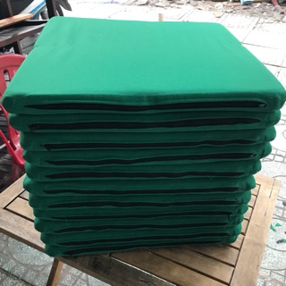 Nệm ngồi dây kéo xanh sọc chéo