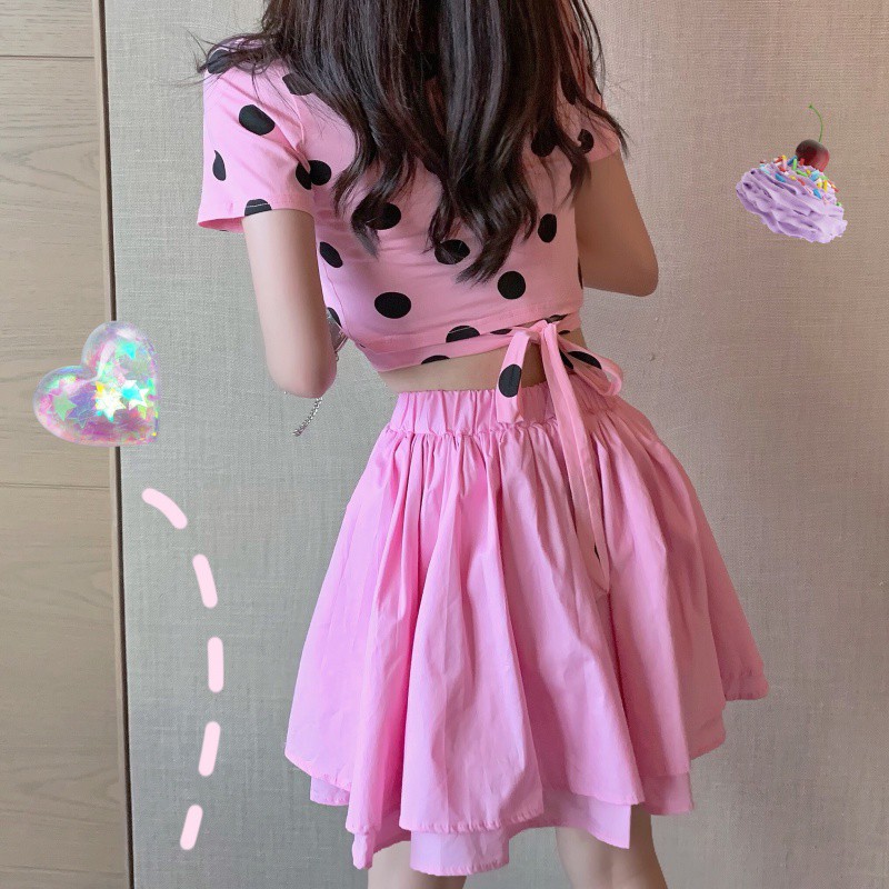 Set áo thun nữ tay ngắn croptop màu hông chấm bi ôm body cột nơ sau lưng + váy ngắn hồng lưng cao ulzzang