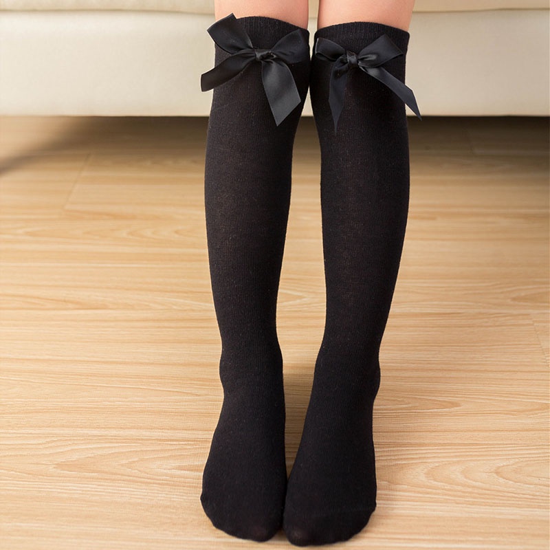 Vớ Cotton Mềm Cổ Cao Qua Gối Màu Trơn Đính Nơ Giữ Ấm Mùa Đông Cho Bé Gái