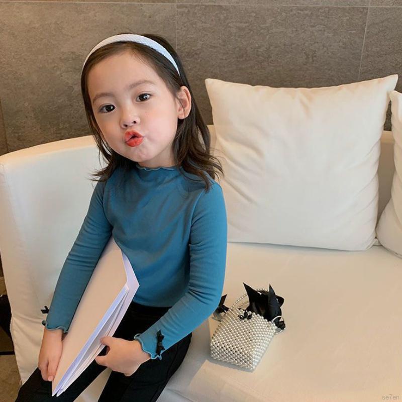 Áo sơ mi dài tay đính nơ màu trơn thời trang mùa thu dành cho bé gái Se7en