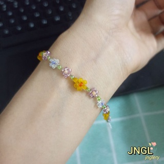 Vòng Tay Hạt Cườm Hình Hoa Màu Vàng TK511