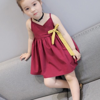 Đầm thoi 2 dây đính nơ vàng