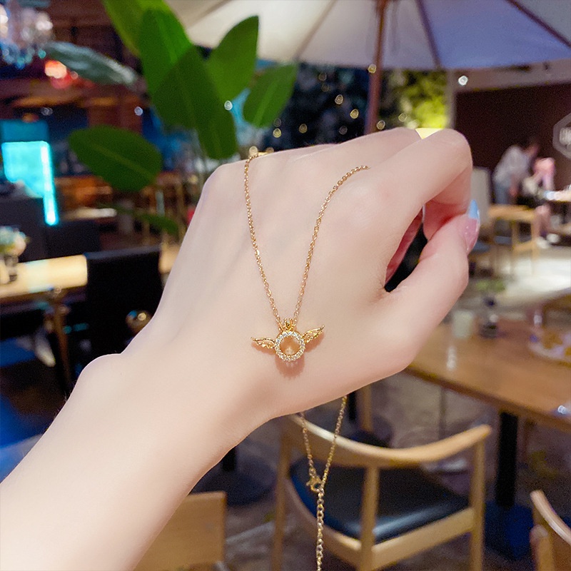Dây chuyền mặt tròn cánh thiên thần tình yêu quà tặng