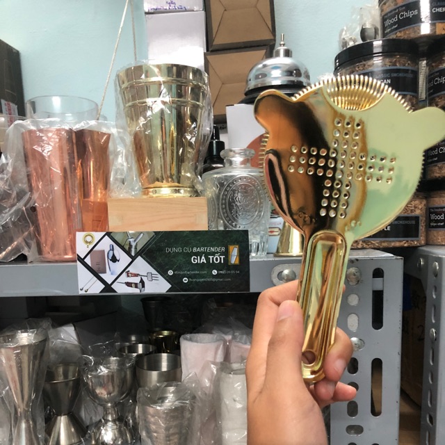 Dụng cụ Lược Đá kiểu chữ thập màu vàng. Hình thật shop tự chụp.