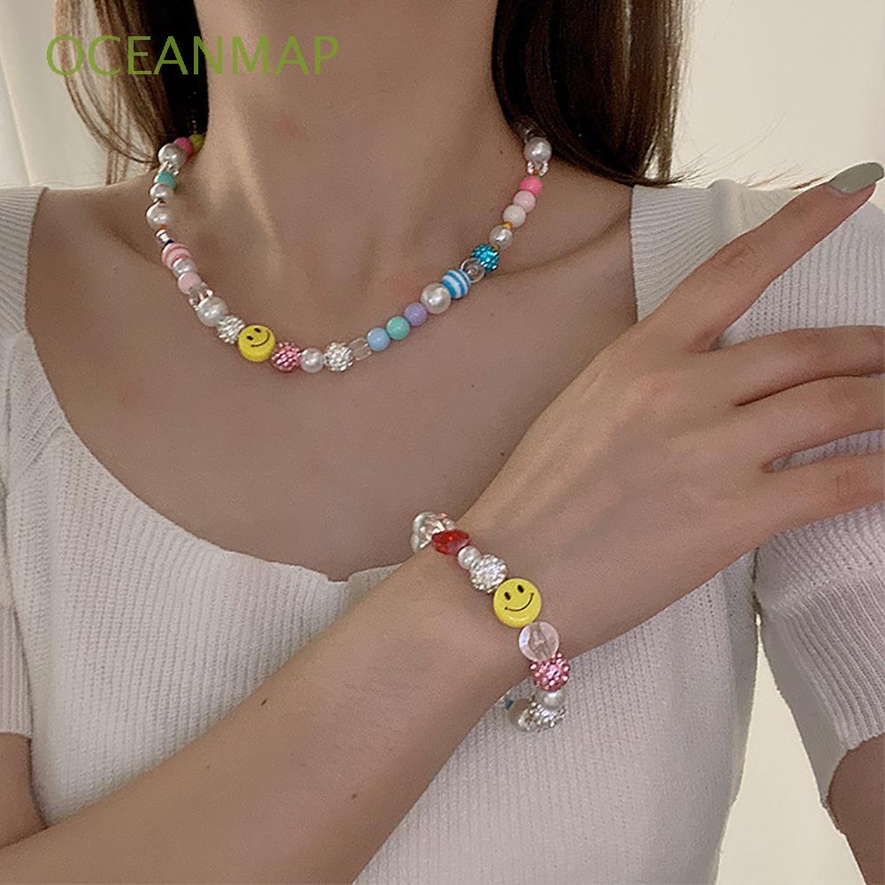 Vòng cổ/ Vòng tay in hình mặt cười đính ngọc trai thiết kế thời trang Hàn Quốc cho nữ