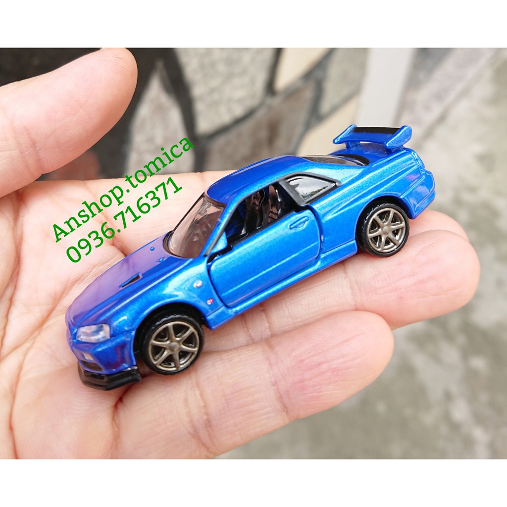 [Mã TOYDEC hoàn 20K xu đơn 50K] Mô hình xe (No11) Nisan màu xanh mở được cửa Premium tomica Nhật Bản (Có Hộp)