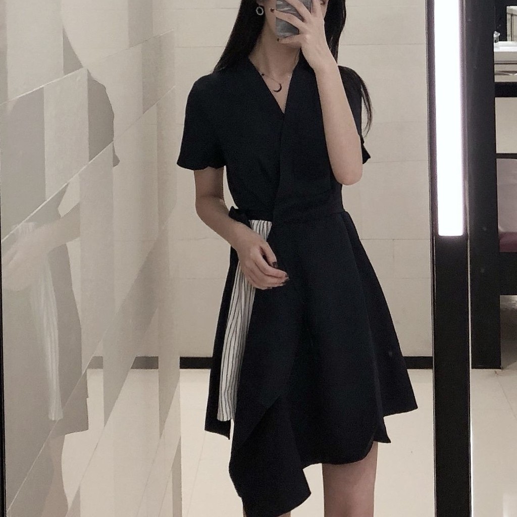 Women's office dress with short sleeves and black skirt
