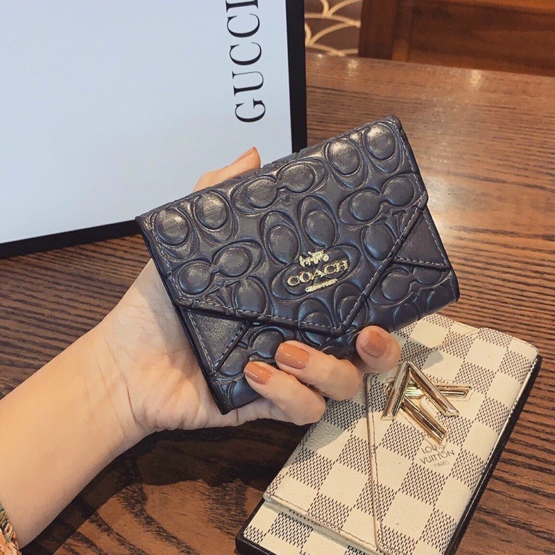 Ví COACH cầm tay