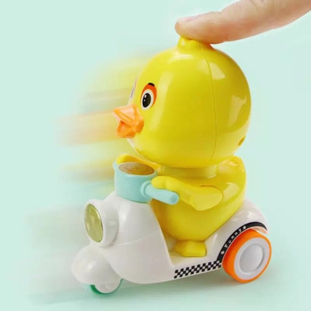 Đồ chơi vịt chạy xe Vespa